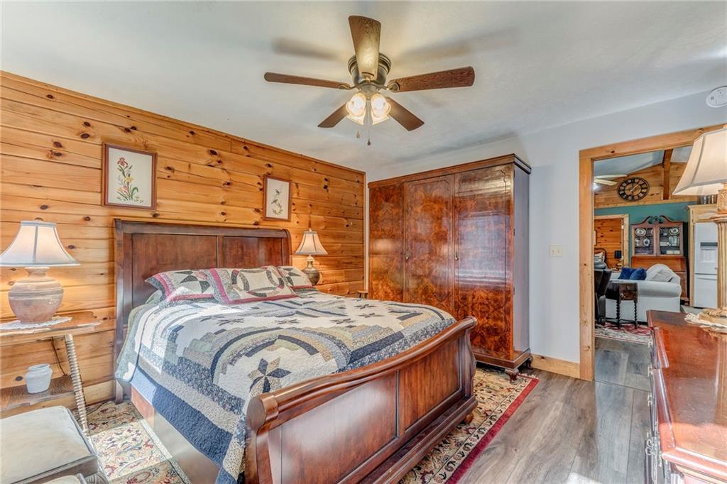 4569 Old Dalton Road Northeast Rome, GA 30165 - Photo 36 of 53 a bed sitting in a bedroom next to a window