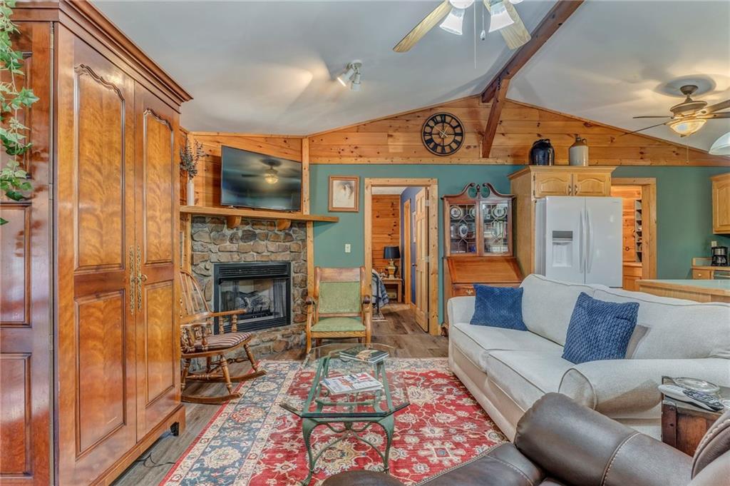 4569 Old Dalton Road Northeast Rome, GA 30165 - Photo 4 of 53 a living room with furniture and a fireplace