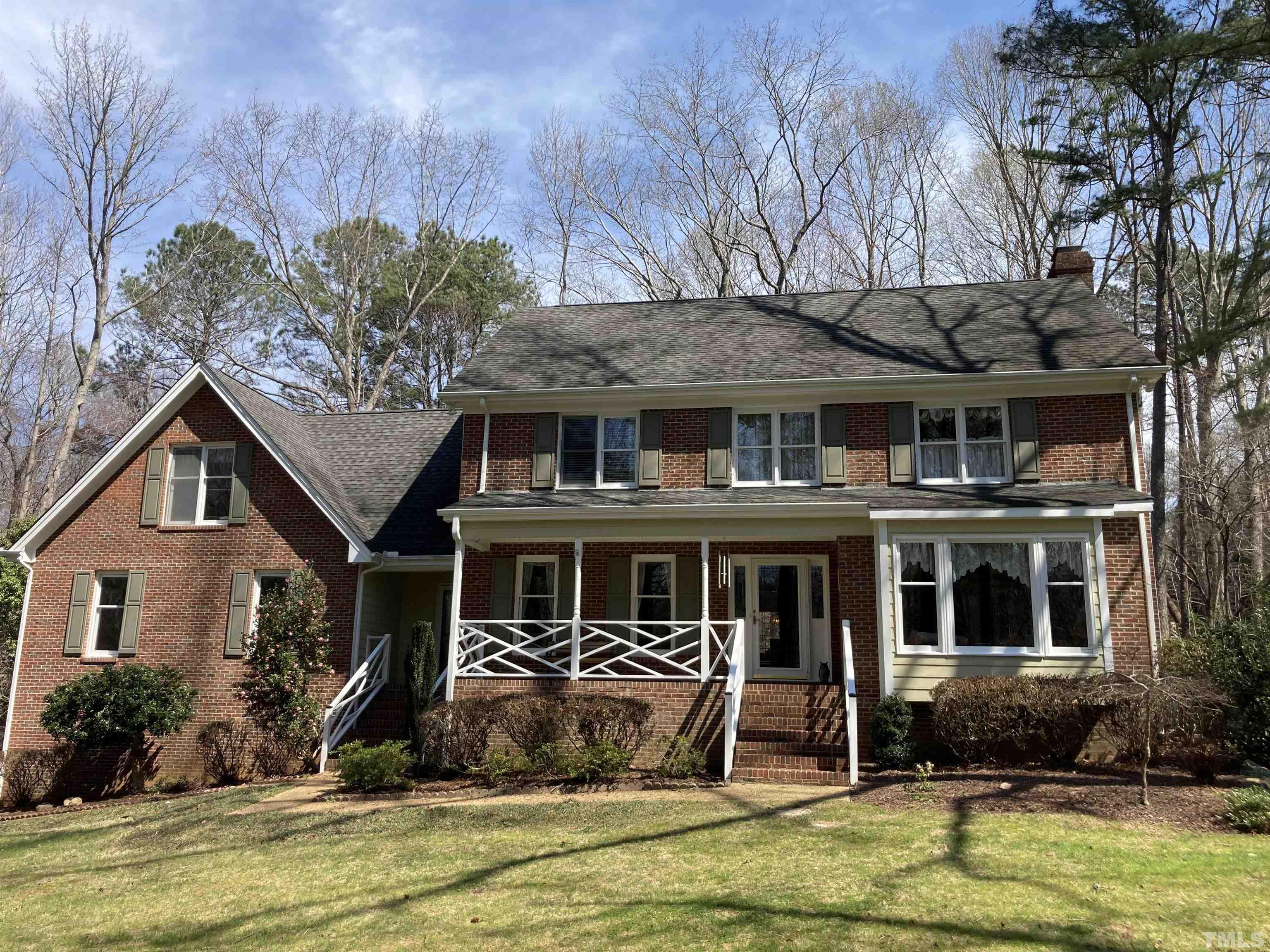 11613 Appaloosa Street West Raleigh, NC 27613 - Photo 2 of 6 a front view of a house with a yard