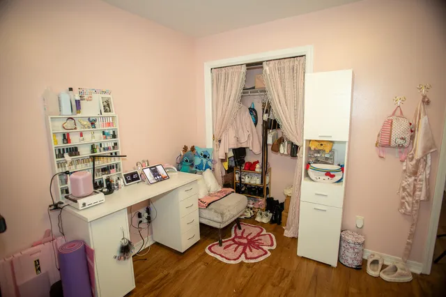 a room with furniture and wooden floor