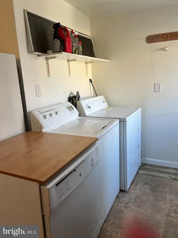 a view of a door and chair in a room