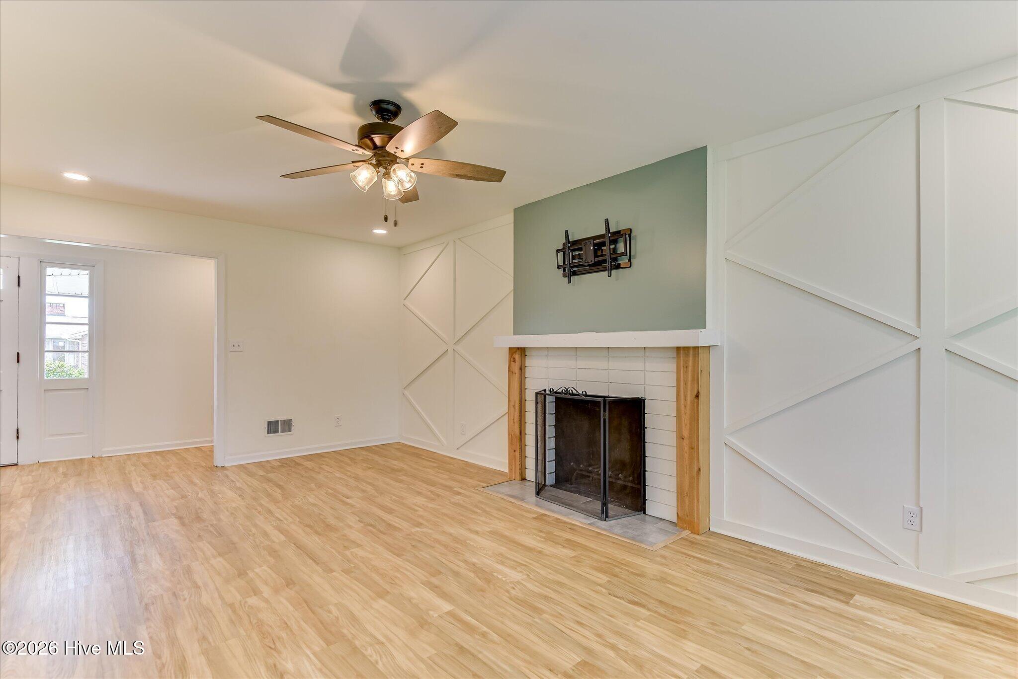 501 Hampton Avenue North Augusta, SC 29841 - Photo 7 of 58 Fireplace and Custom Accent Wall