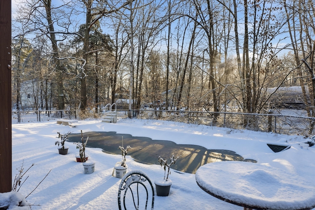 186 Mohawk Trail Haverhill, MA 01832 - Photo 35 of 42 a view of a swimming pool with a patio