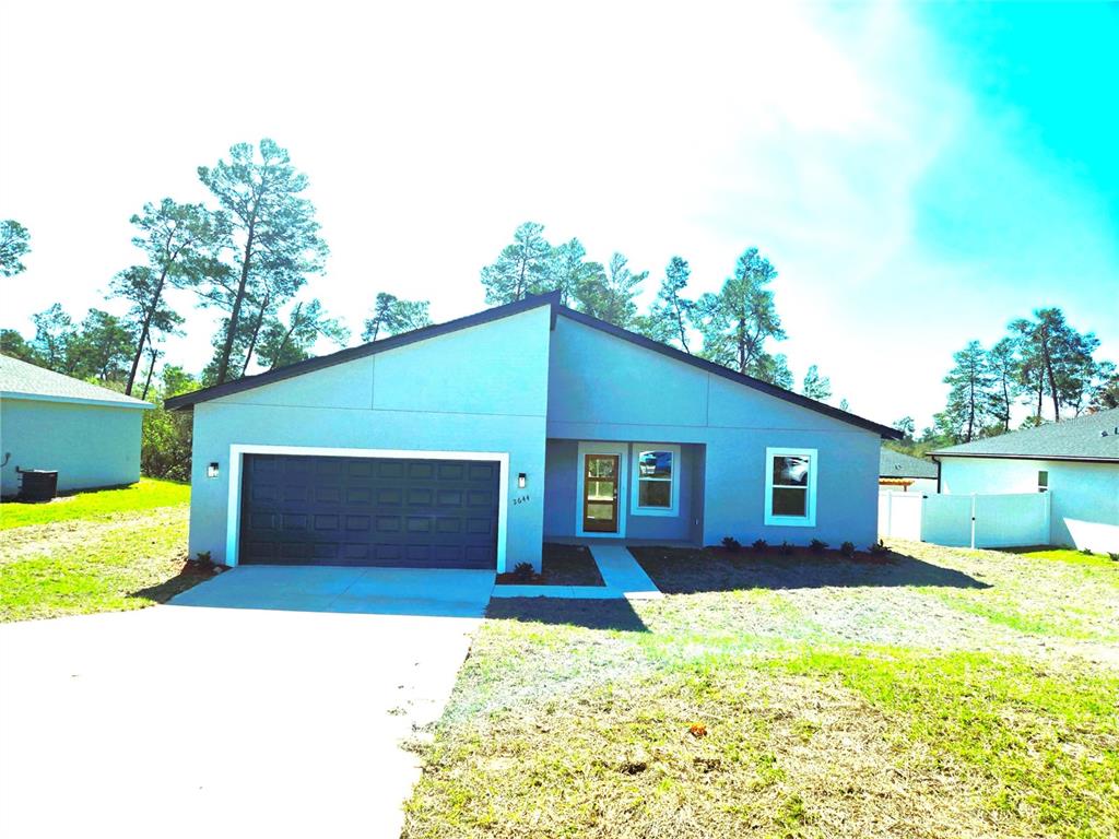 2644 Southwest 162nd Street Road Ocala, FL 34473 - Photo 1 of 47 a house view with a outdoor space
