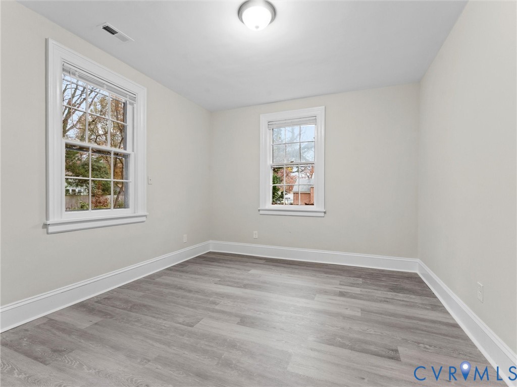 3928 East Broad Rock Road Richmond, VA 23224 - Photo 22 of 34 an empty room with windows