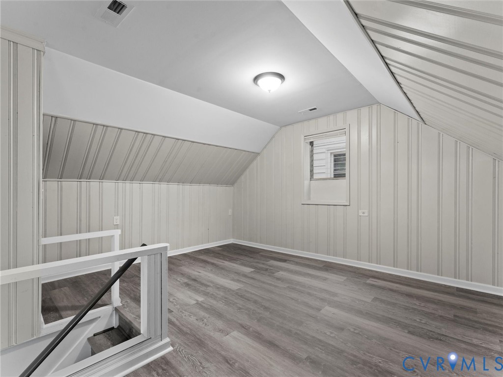 3928 East Broad Rock Road Richmond, VA 23224 - Photo 25 of 34 a view of an empty room with wooden floor