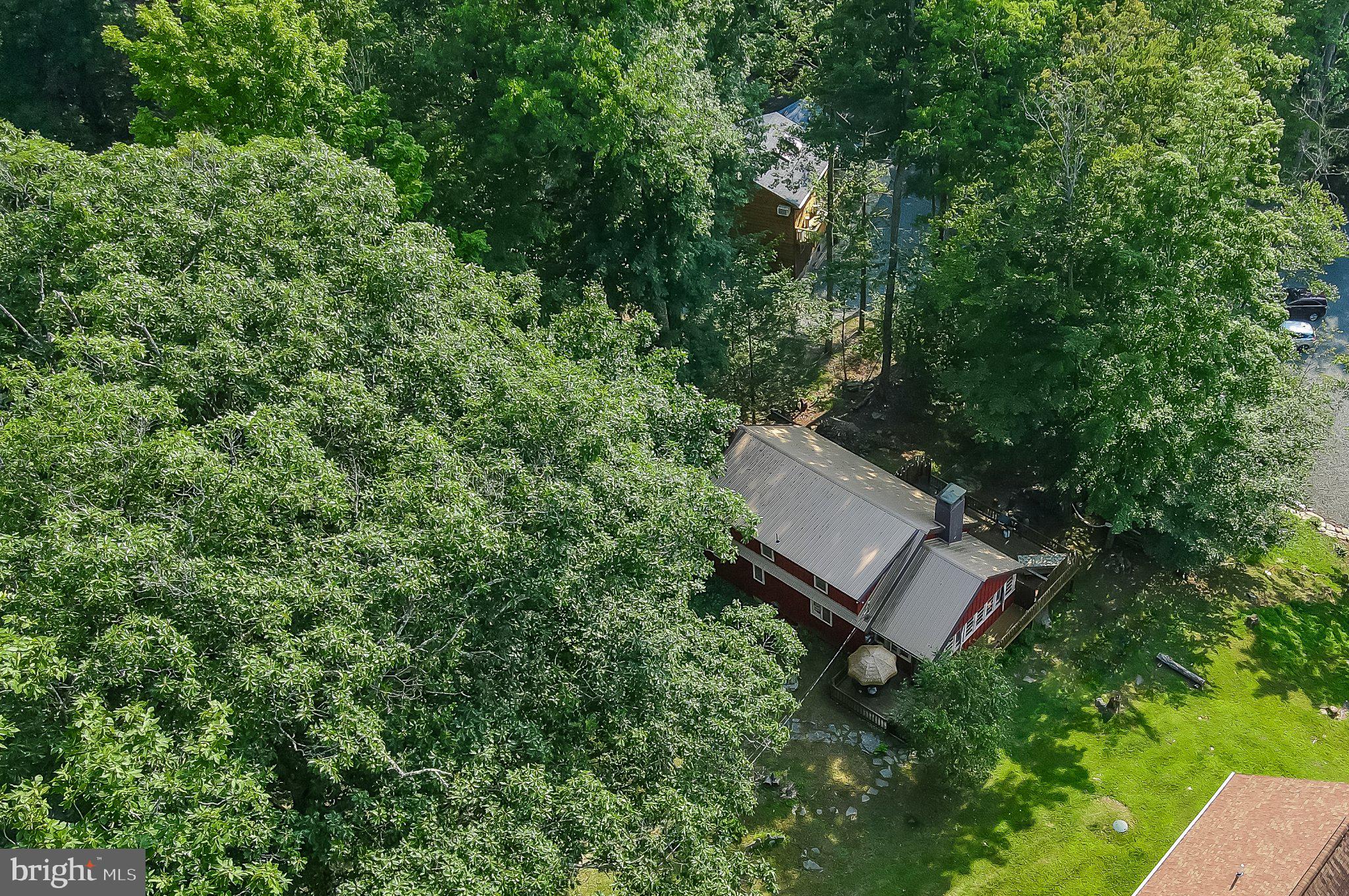 112 Beechwood Cove Road Greentown, PA 18426 - Photo 53 of 59 an aerial view of a house with a yard