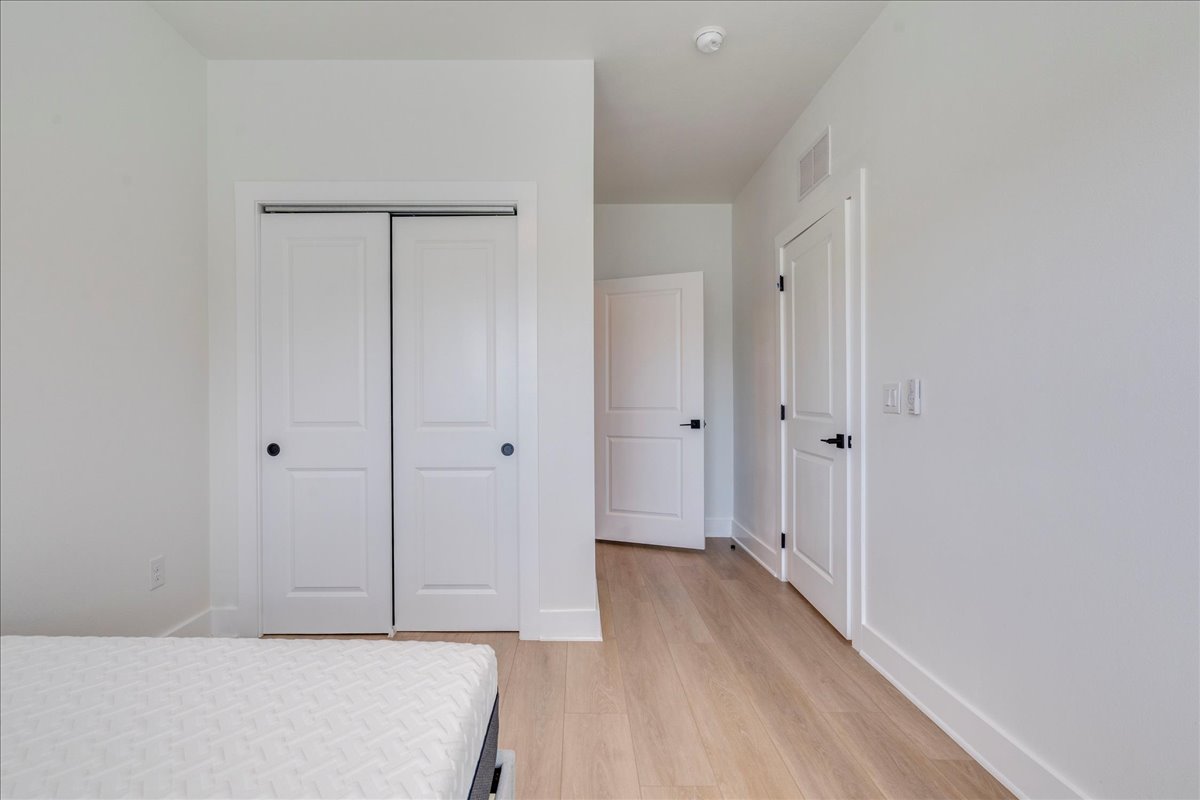 3000 Duval Street, Unit 203 Austin, TX 78705 - Photo 14 of 27 a view of hallway with wooden floor