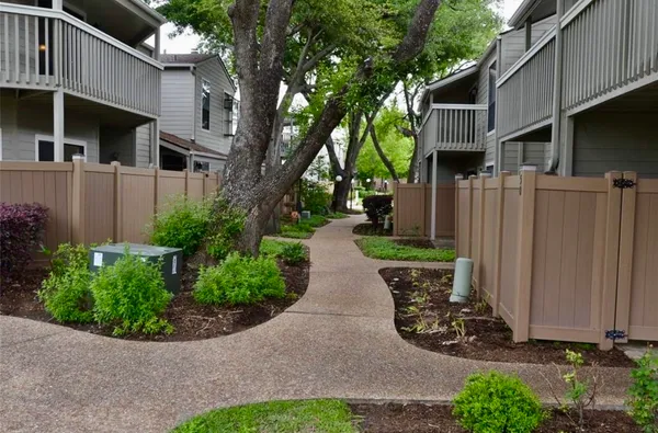 a view of a back yard of the house