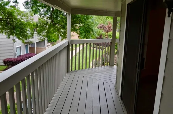 a view of a balcony with lake view
