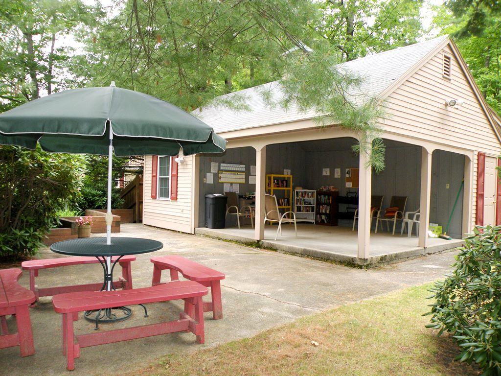 3 Fieldstone Court, Unit 3 Portland, ME 04103 - Photo 33 of 39 Clubhouse, patio and picnic tables