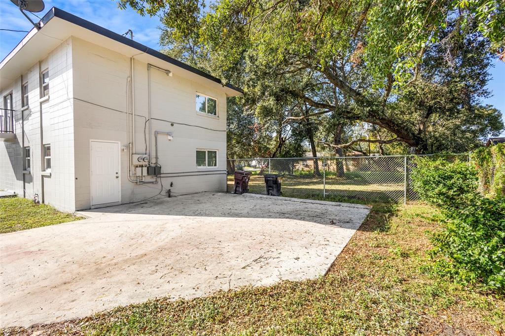 901 Colyer Street, Unit A & B Orlando, FL 32805 - Photo 22 of 32 a view of a back yard