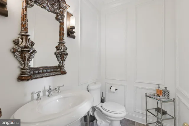 a view of a livingroom with furniture and a chandelier