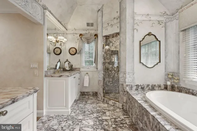 an aerial view of a house with a garden