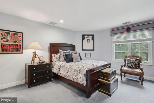 a view of a garden with a building in the background