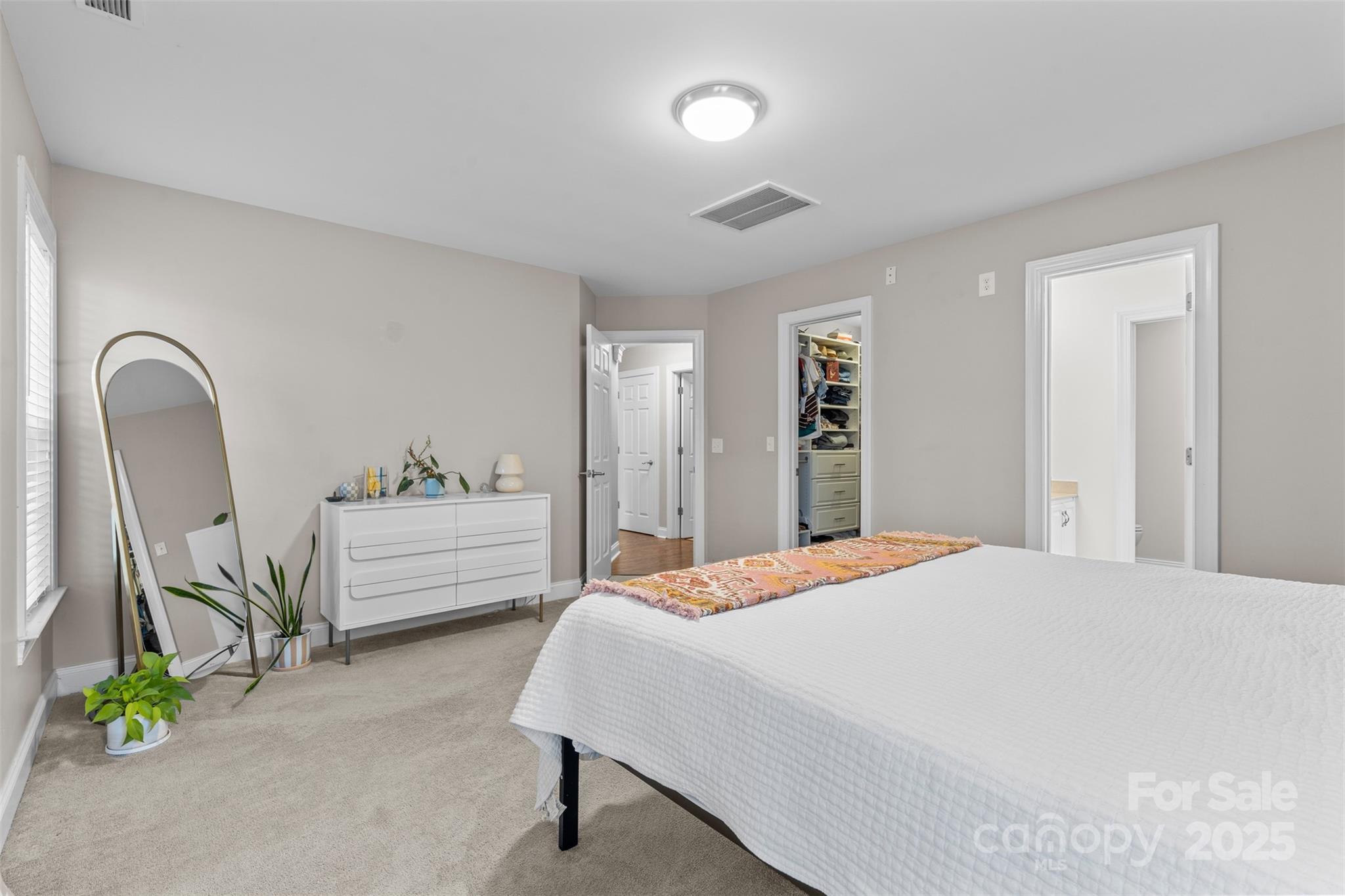 1108 Blowing Rock Cove Fort Mill, SC 29708 - Photo 16 of 43 a bedroom with a bed and a dresser