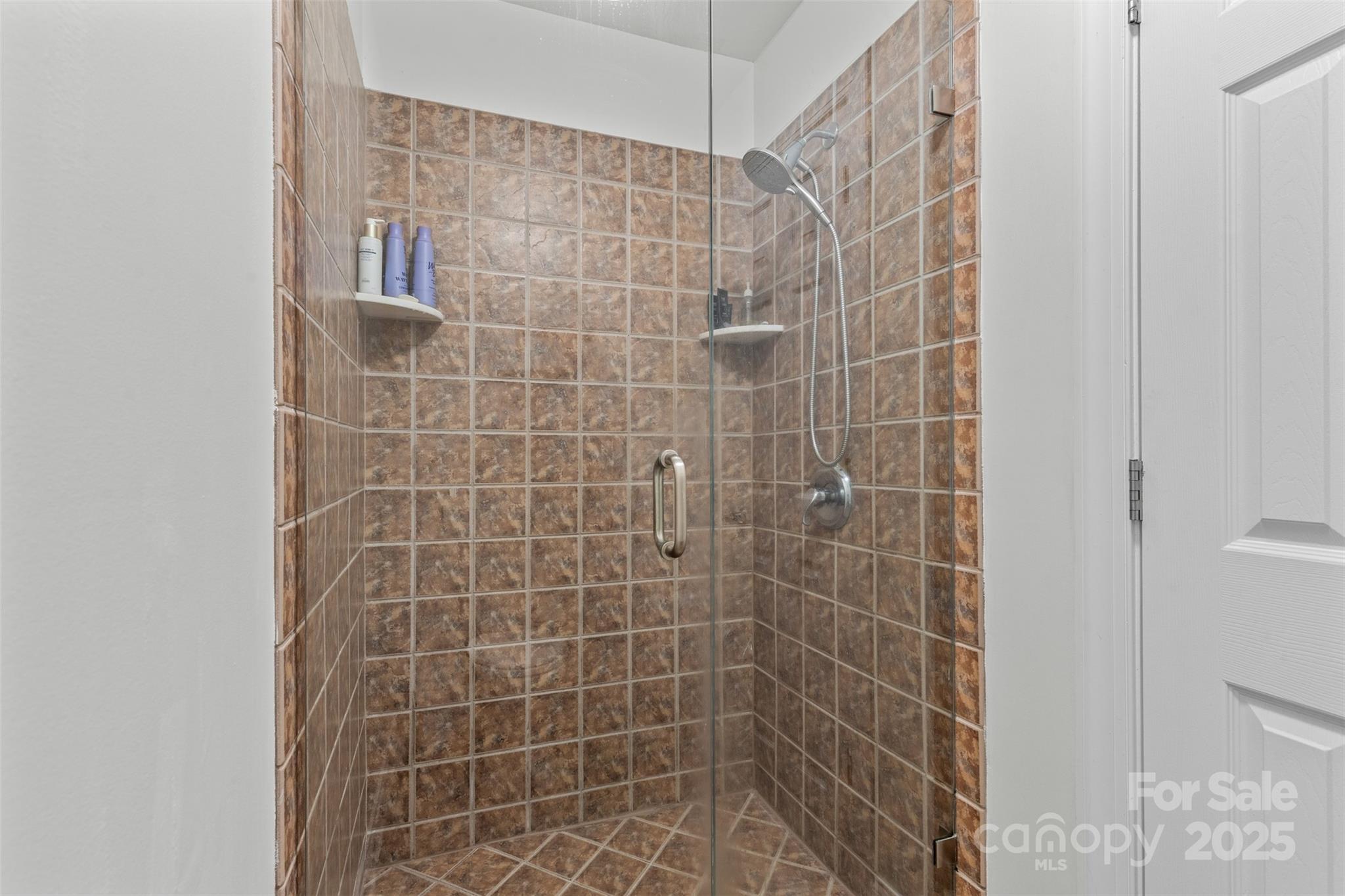 1108 Blowing Rock Cove Fort Mill, SC 29708 - Photo 19 of 43 a bathroom with a shower