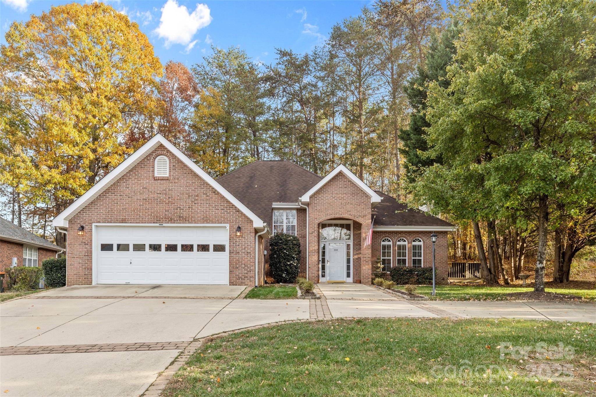 1108 Blowing Rock Cove Fort Mill, SC 29708 - Photo 2 of 43 a front view of a house with a yard and garage