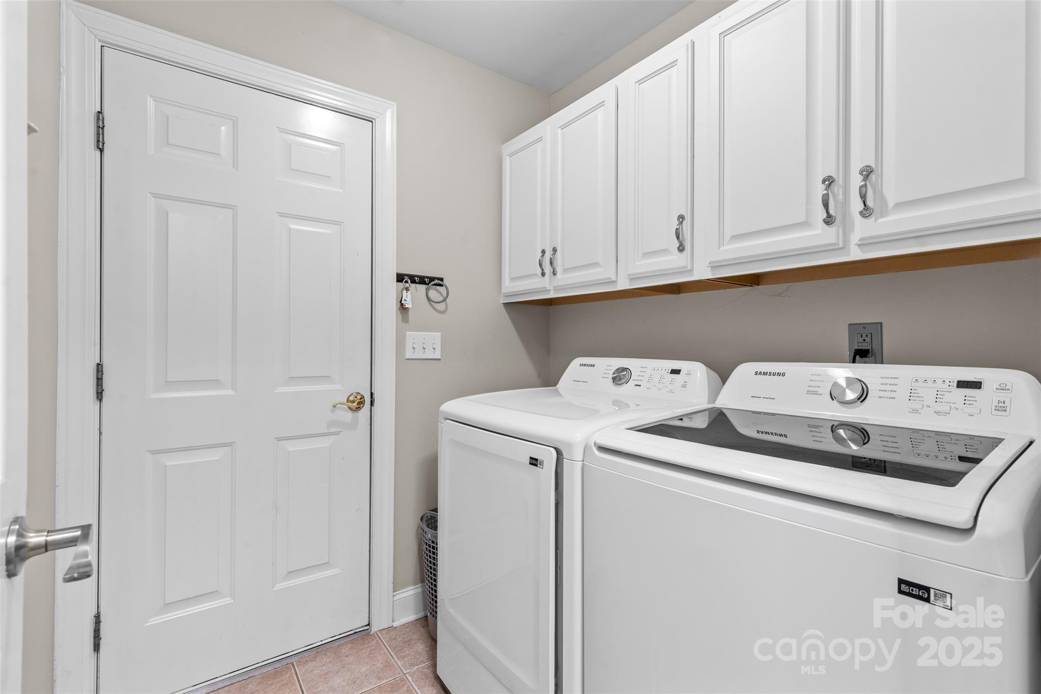 1108 Blowing Rock Cove Fort Mill, SC 29708 - Photo 22 of 43 a utility room with dryer and washer
