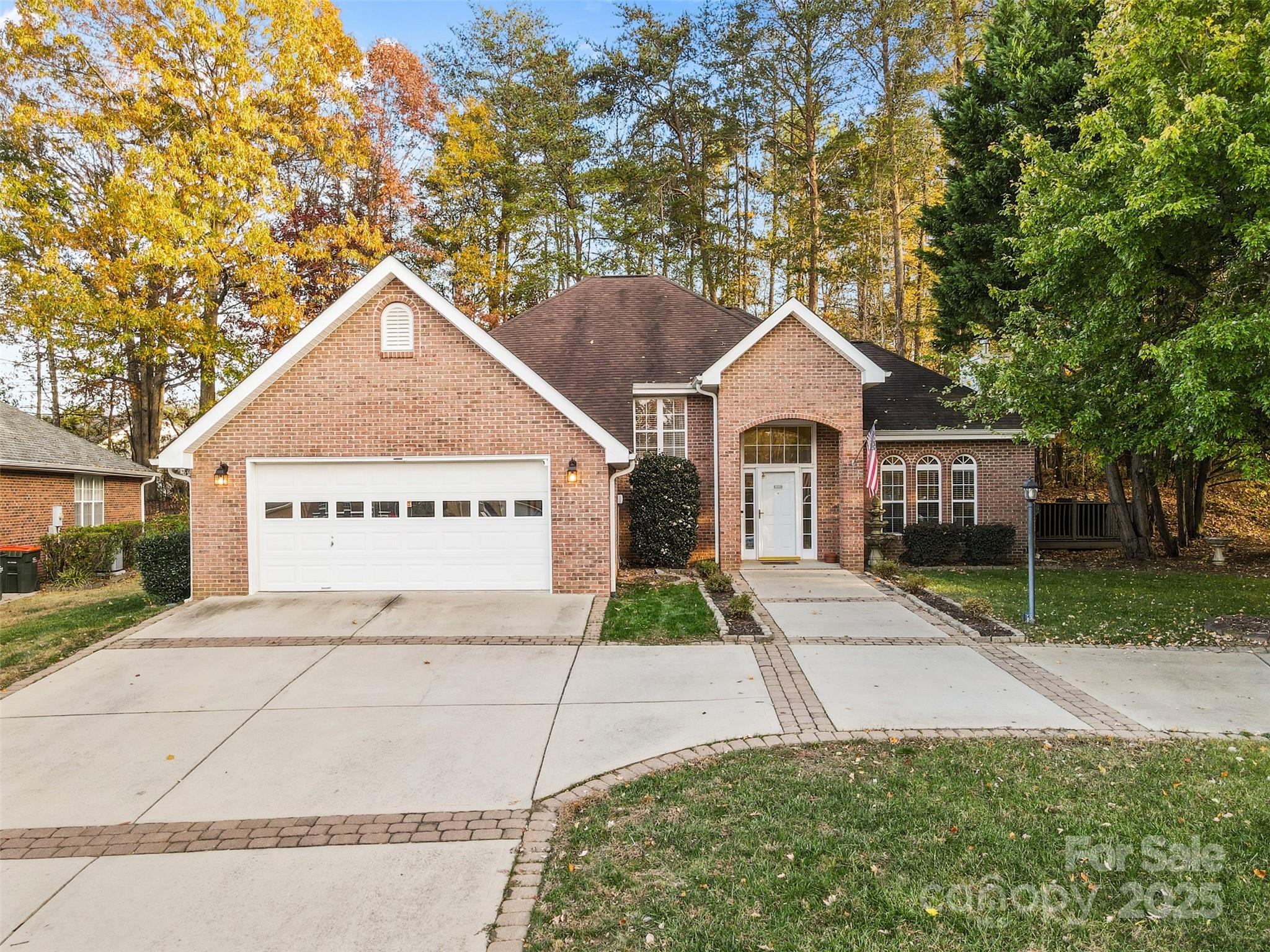 1108 Blowing Rock Cove Fort Mill, SC 29708 - Photo 40 of 43 a front view of a house with a yard and garage