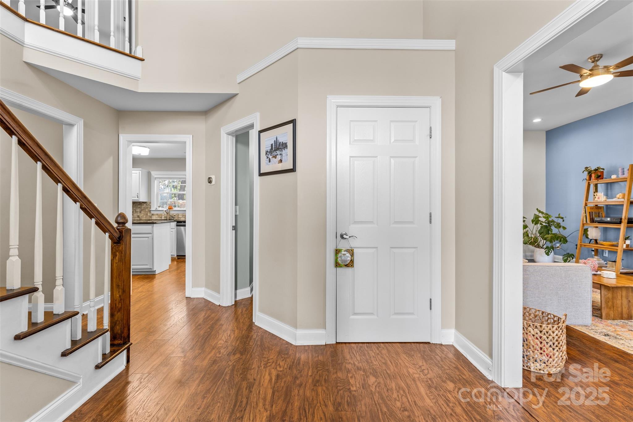 1108 Blowing Rock Cove Fort Mill, SC 29708 - Photo 5 of 43 a view of entryway with wooden floor and stairs