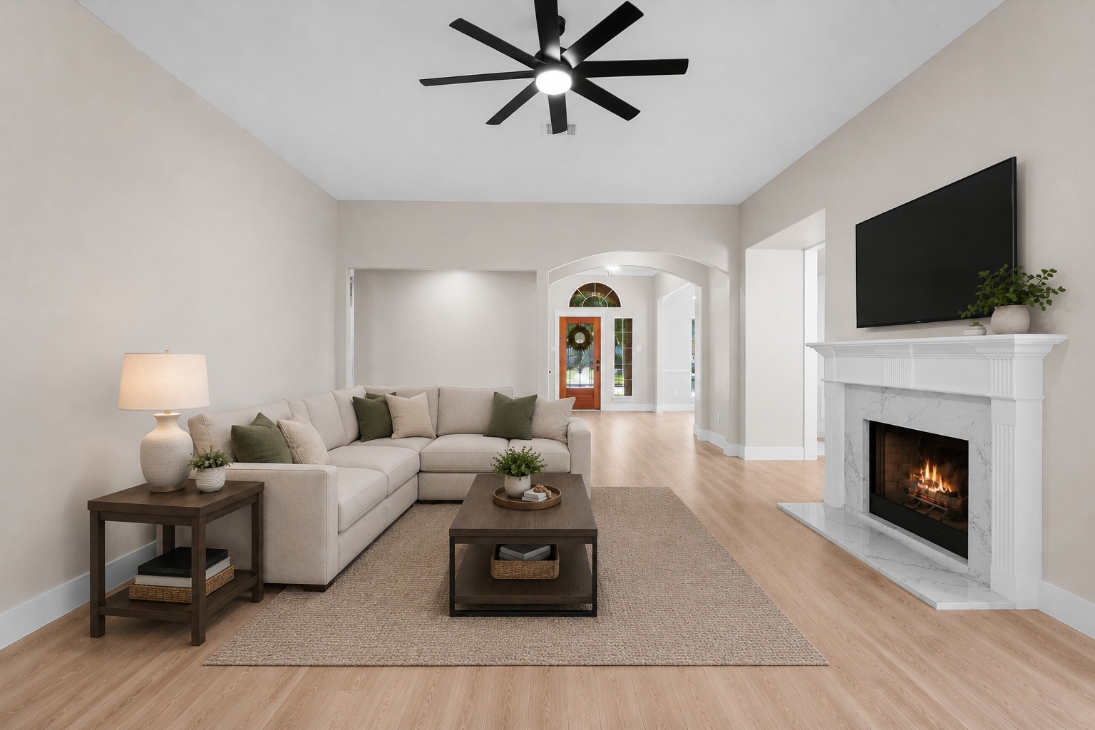 30111 Granum Drive Spring, TX 77386 - Photo 7 of 45 a living room with furniture a flat screen tv and a fireplace