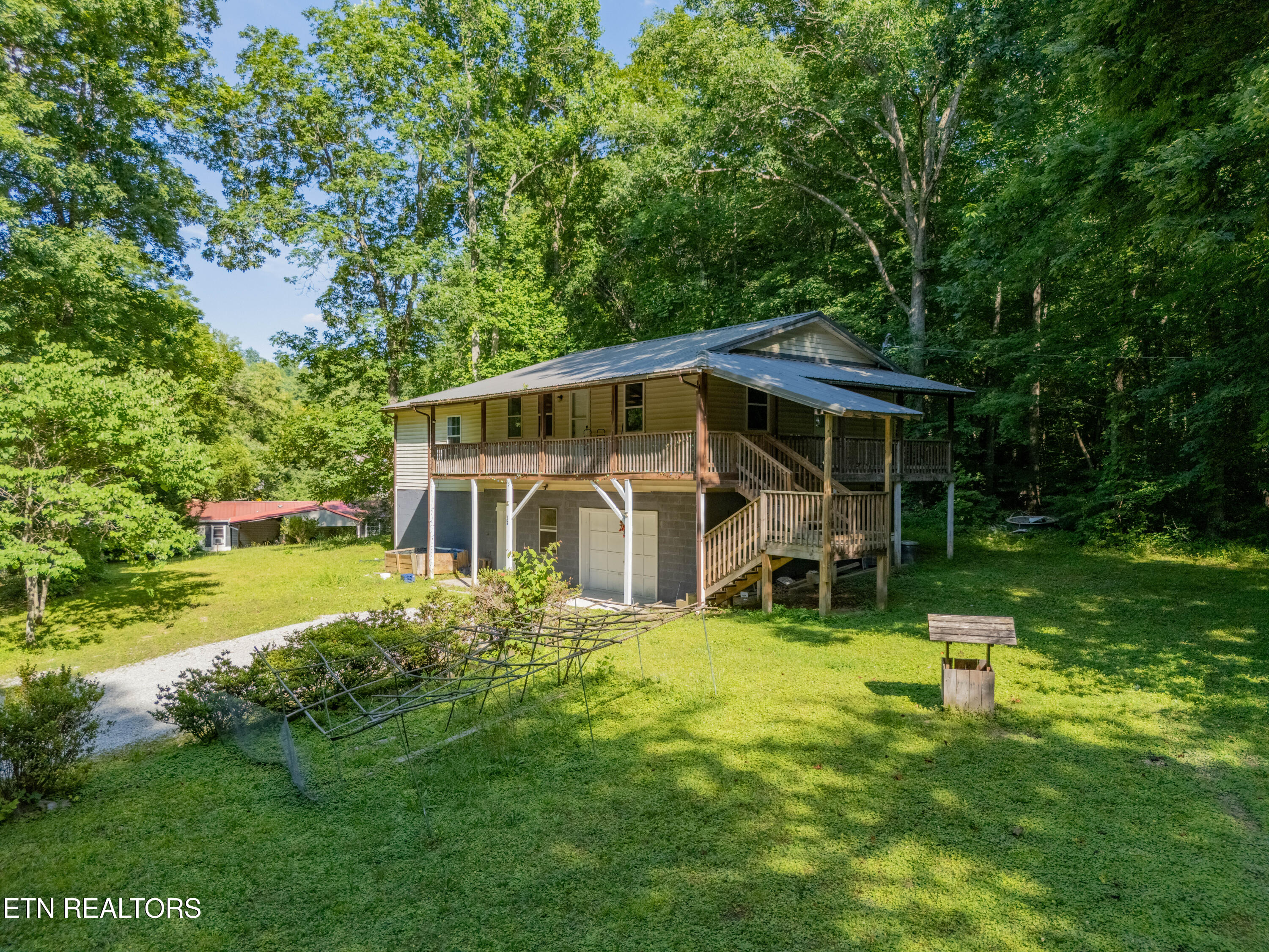 106 Guy Hamby Road Lancing, TN 37770 - Photo 3 of 24 DJI_20260617172946_0096_D-HDR