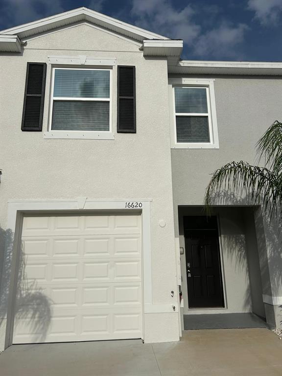 16620 Grotto Steam Place Wimauma, FL 33598 - Photo 2 of 19 a front view of a house