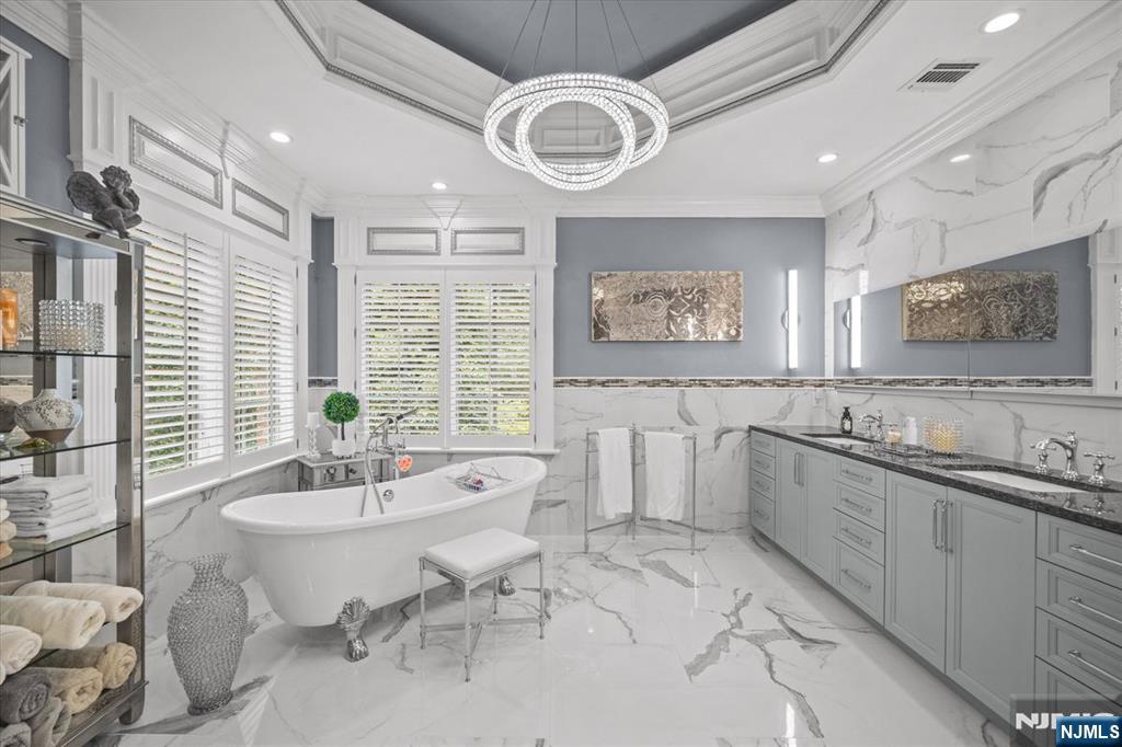 29 North Church Road Saddle River, NJ 07458 - Photo 23 of 42 a large white kitchen with a large window