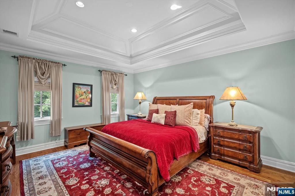 29 North Church Road Saddle River, NJ 07458 - Photo 27 of 42 a bed room with a bed and a lamp