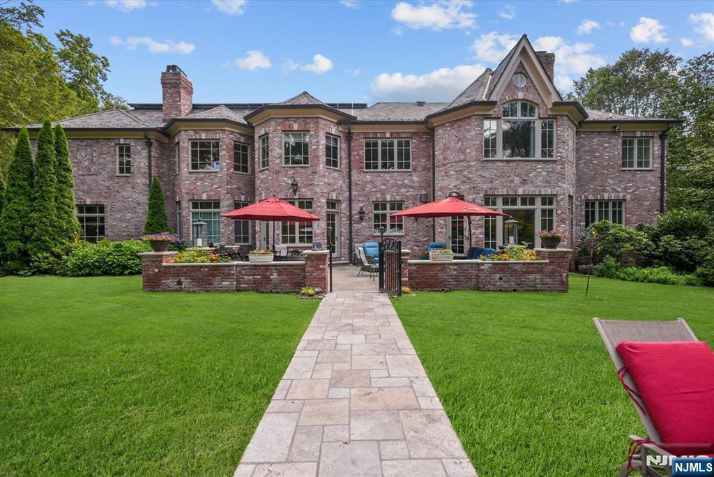 29 North Church Road Saddle River, NJ 07458 - Photo 6 of 42 a front view of a house with a yard