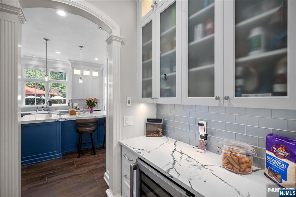 29 North Church Road Saddle River, NJ 07458 - Photo 9 of 42 a kitchen with a sink and cabinets