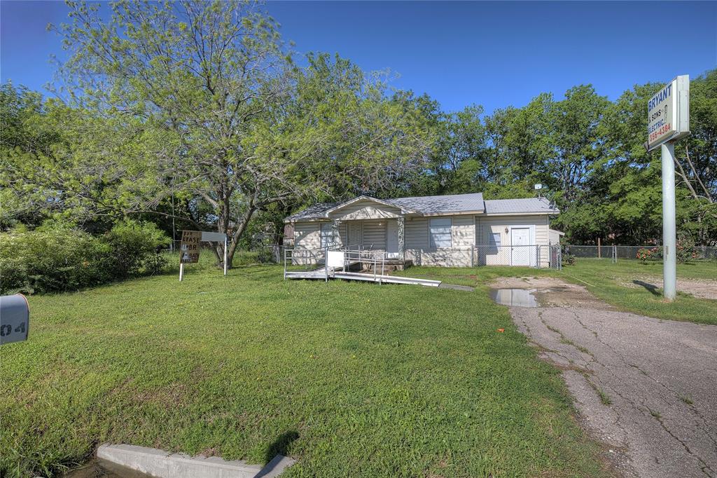 8782 Highway 34 Quinlan, TX 75474 - Photo 19 of 37 a view of a house with backyard and garden
