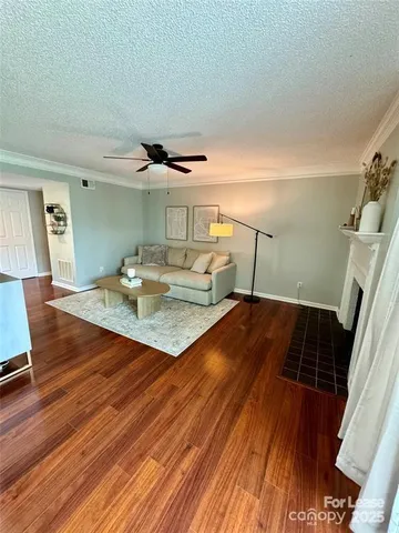 a living room with wooden floor