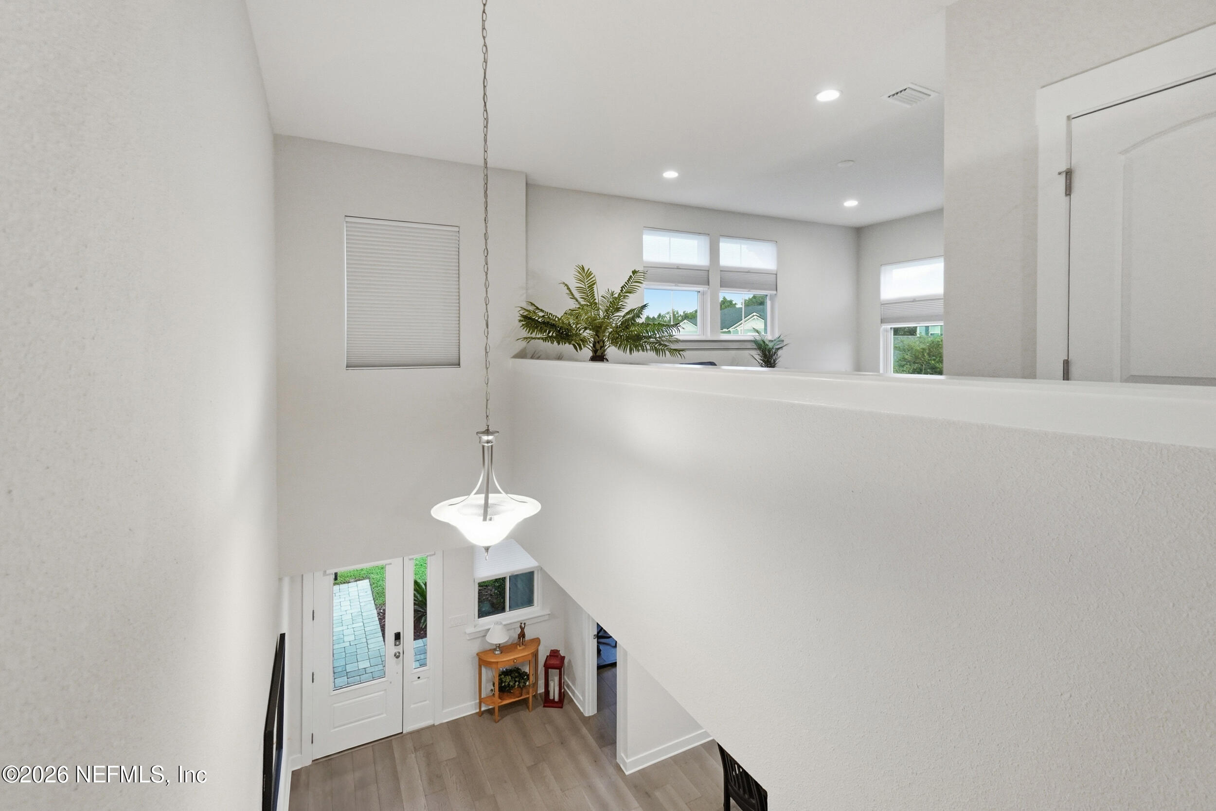 34 Red Rock Lane St. Johns, FL 32259 - Photo 33 of 71 a view of a hallway with furniture and a potted plant
