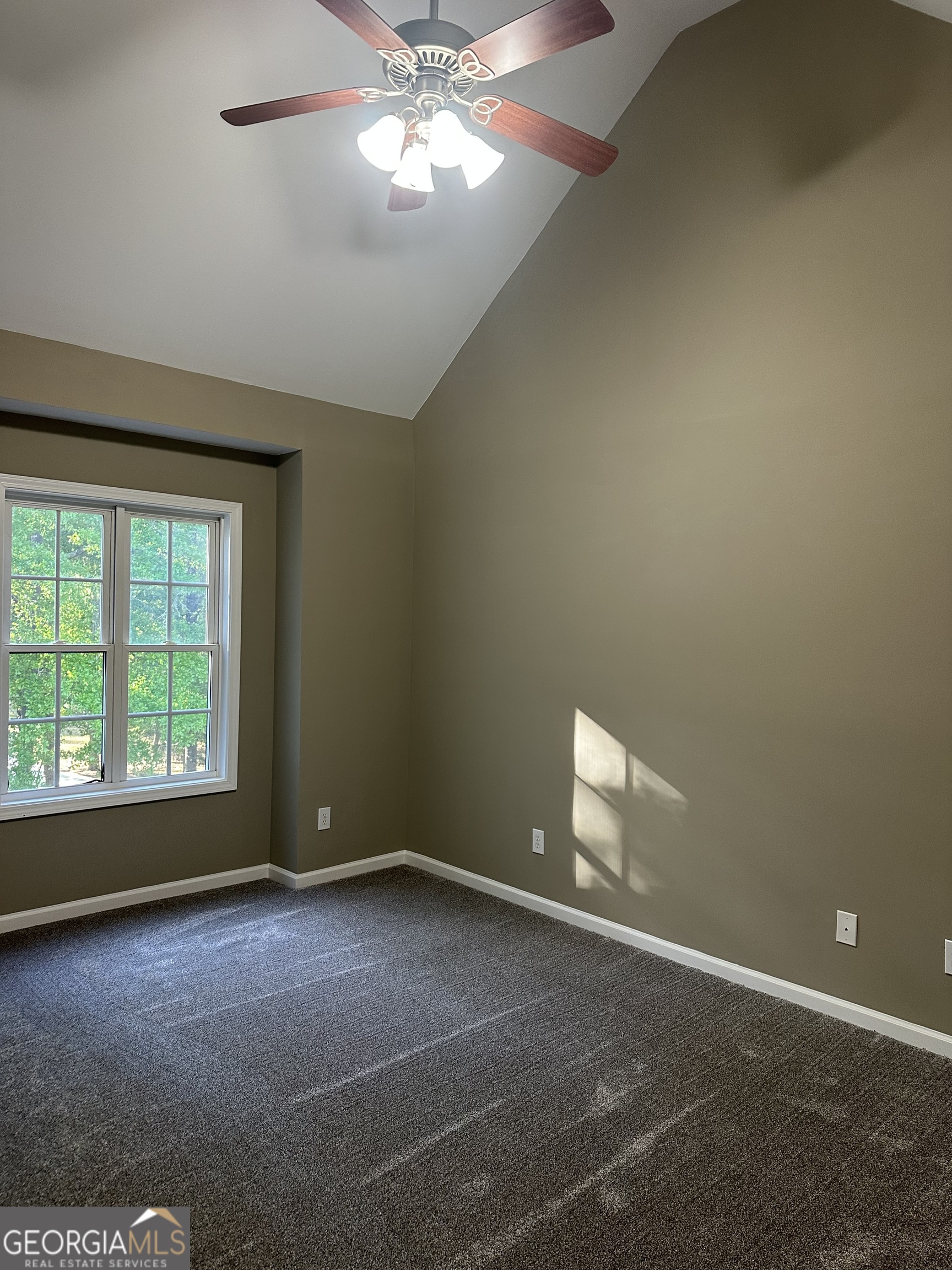 65 Spratlin Way Hull, GA 30646 - Photo 24 of 35 an empty room with a window