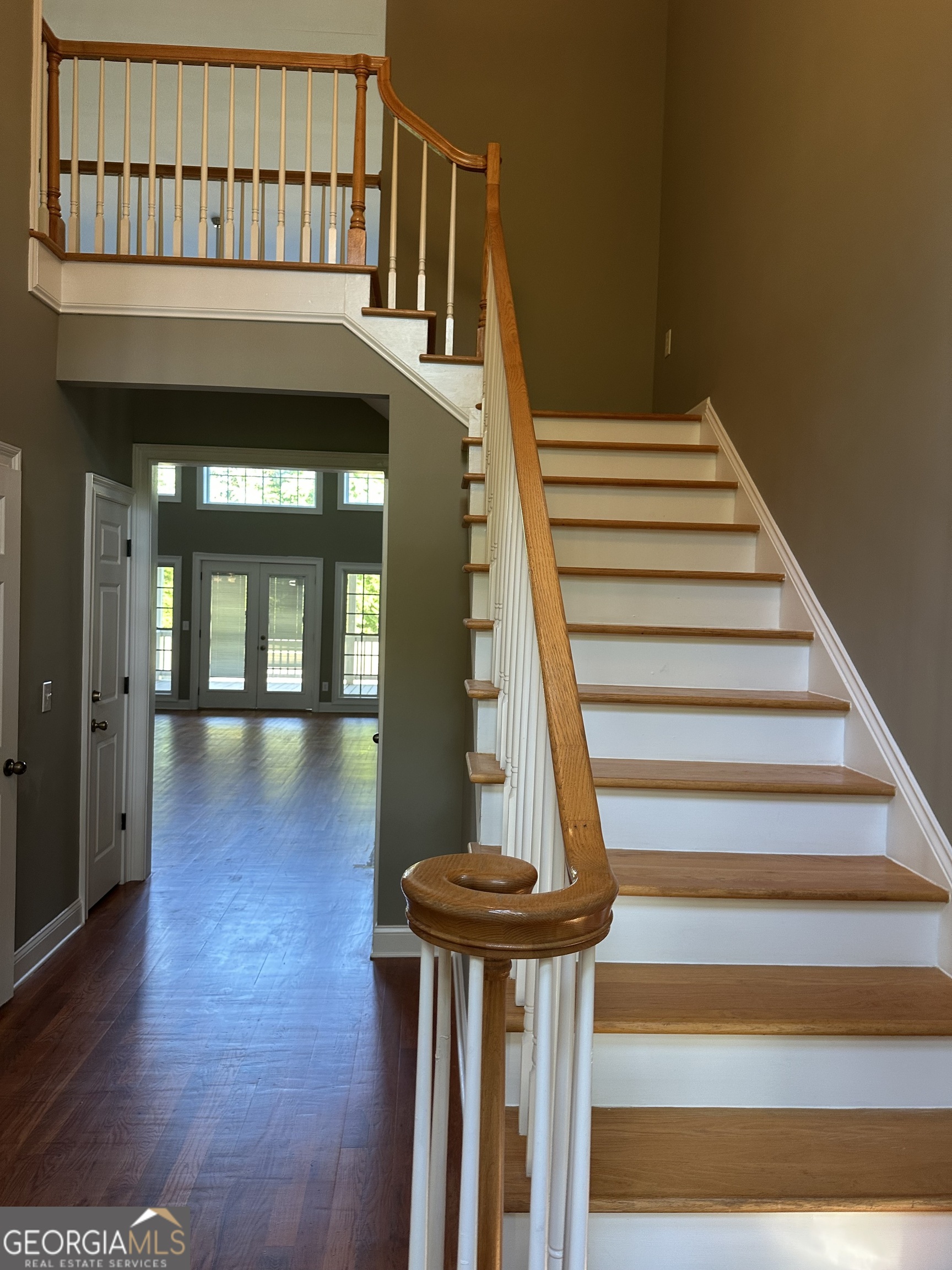 65 Spratlin Way Hull, GA 30646 - Photo 9 of 35 a view of entryway with wooden floor and a front door