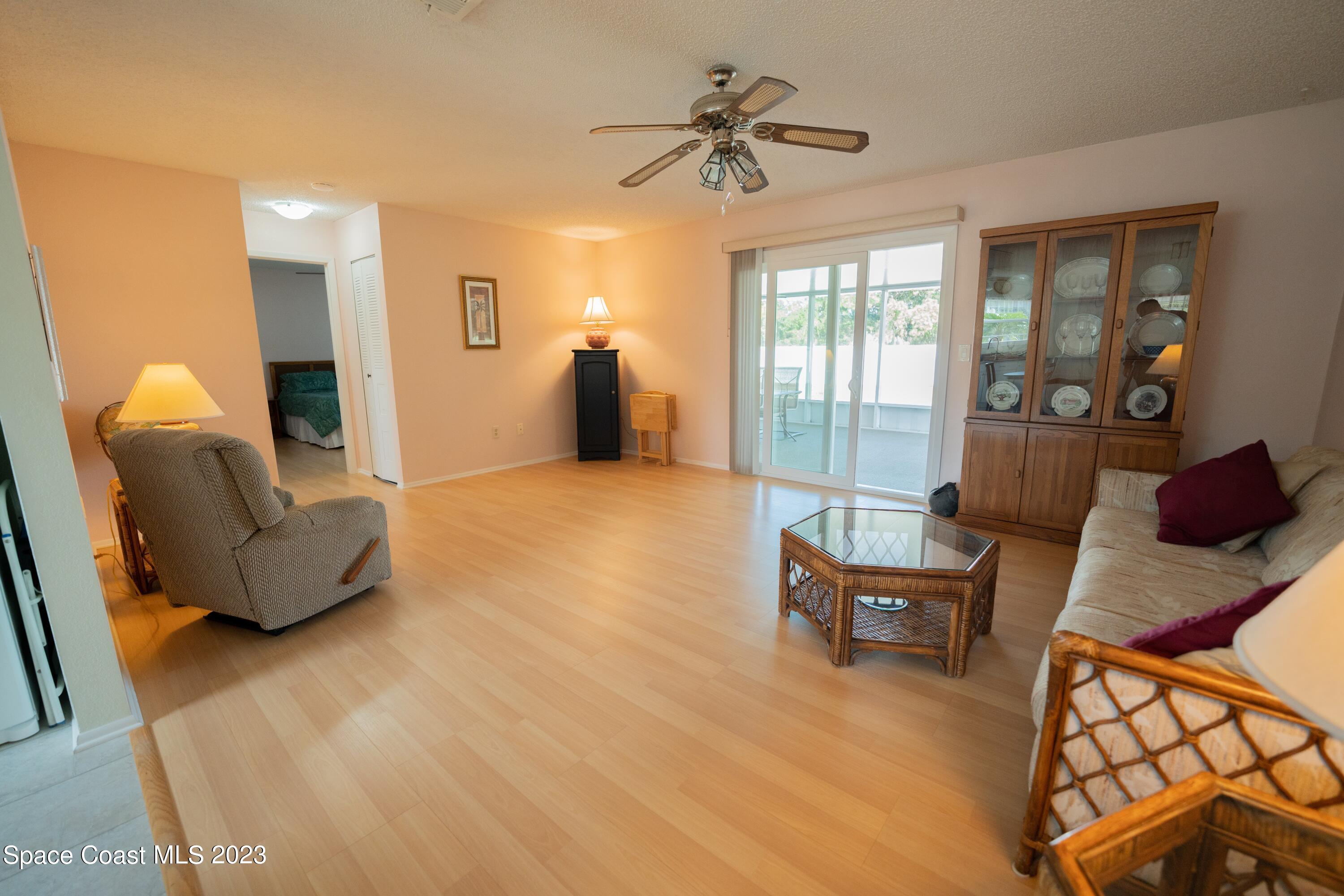 920 Gables Way Melbourne, FL 32940 - Photo 12 of 24 a living room with furniture and a window