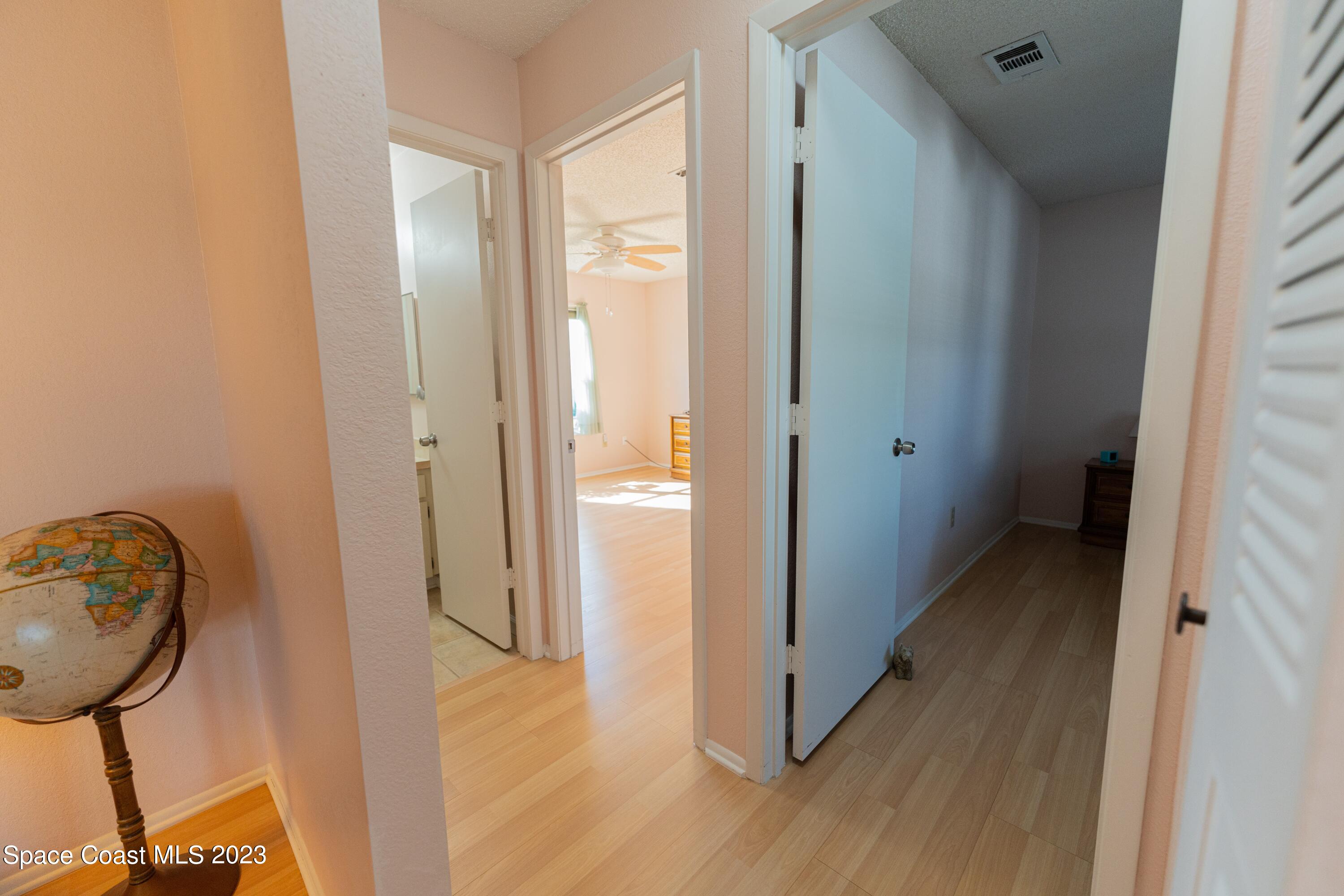 920 Gables Way Melbourne, FL 32940 - Photo 14 of 24 a view of a bathroom from a hallway