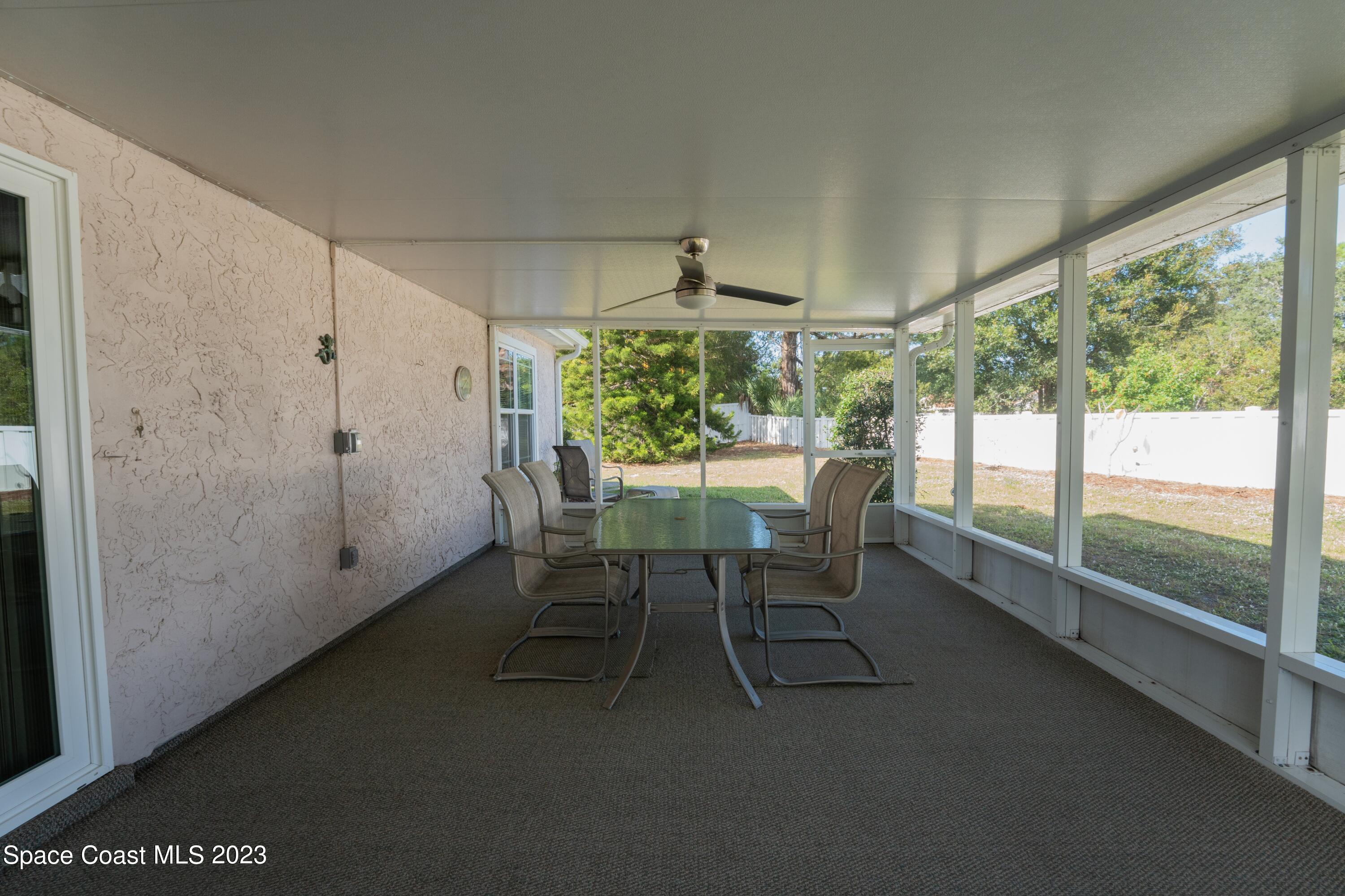 920 Gables Way Melbourne, FL 32940 - Photo 24 of 24 a dining room with furniture and a window