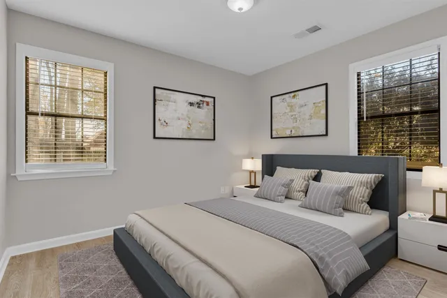 a bathroom with a sink toilet tub and shower