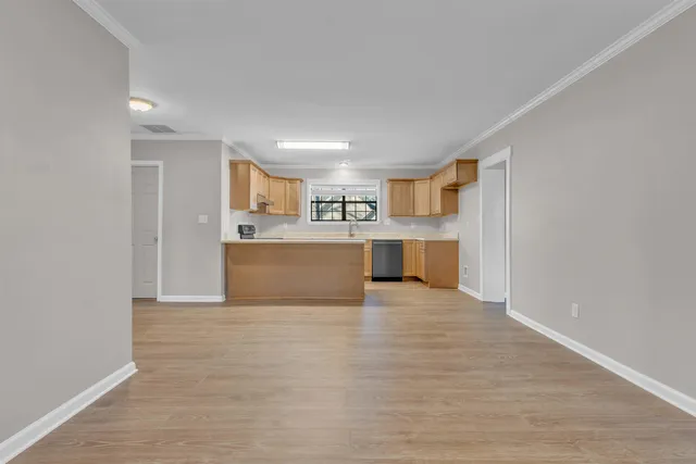 a view of a kitchen with a sink