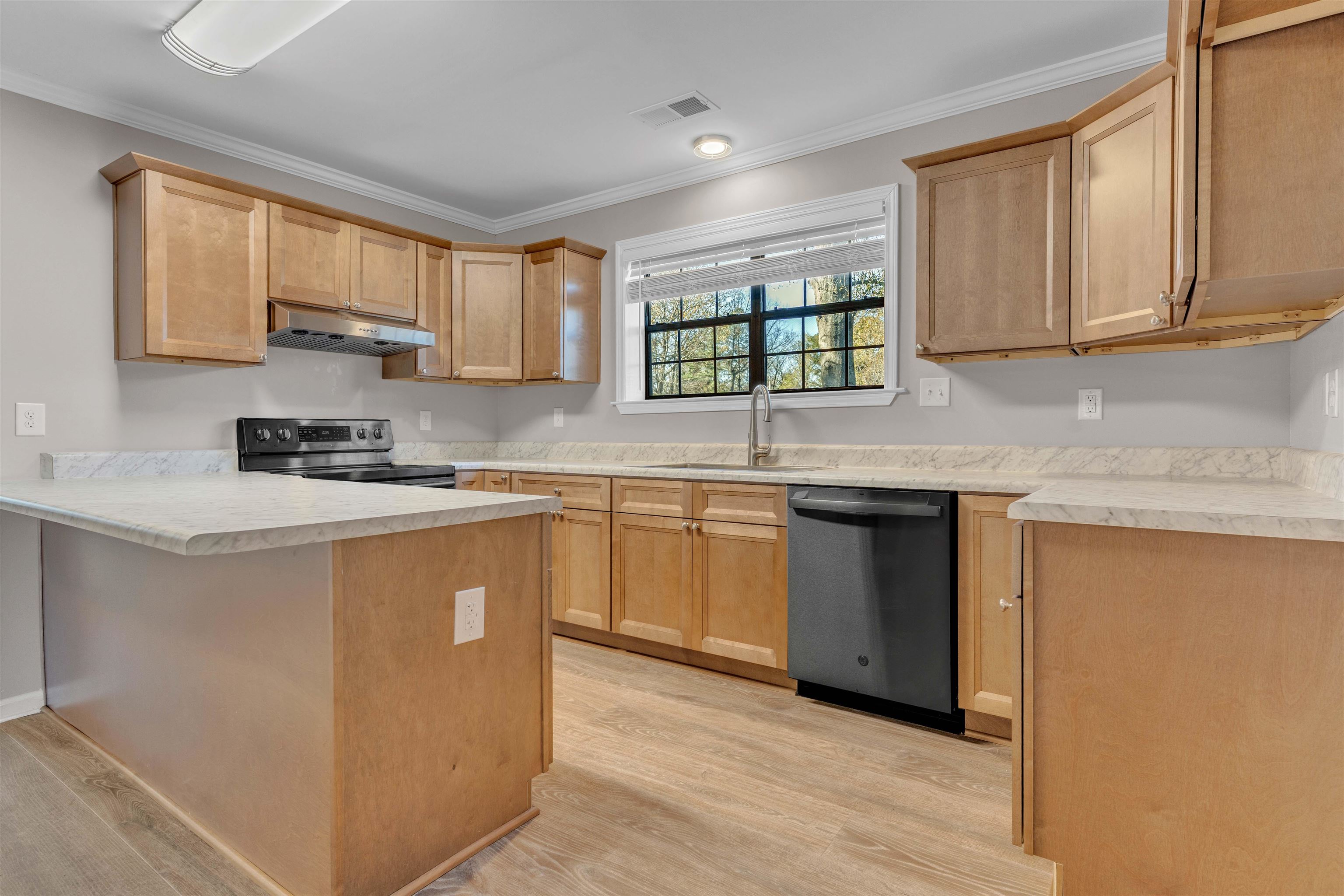 4163 Fonta Road Bartlett, TN 38002 - Photo 7 of 27 a kitchen with stainless steel appliances granite countertop a stove a sink and a microwave