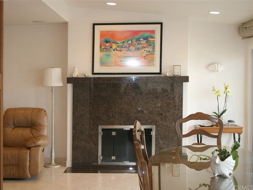 614 The Strand Manhattan Beach, CA 90266 - Photo 18 of 41 a living room with furniture and a flat screen tv