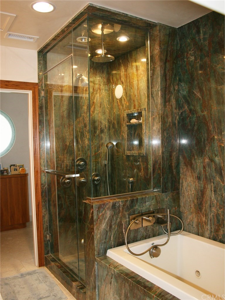 614 The Strand Manhattan Beach, CA 90266 - Photo 25 of 41 a bathroom with a sink and a mirror