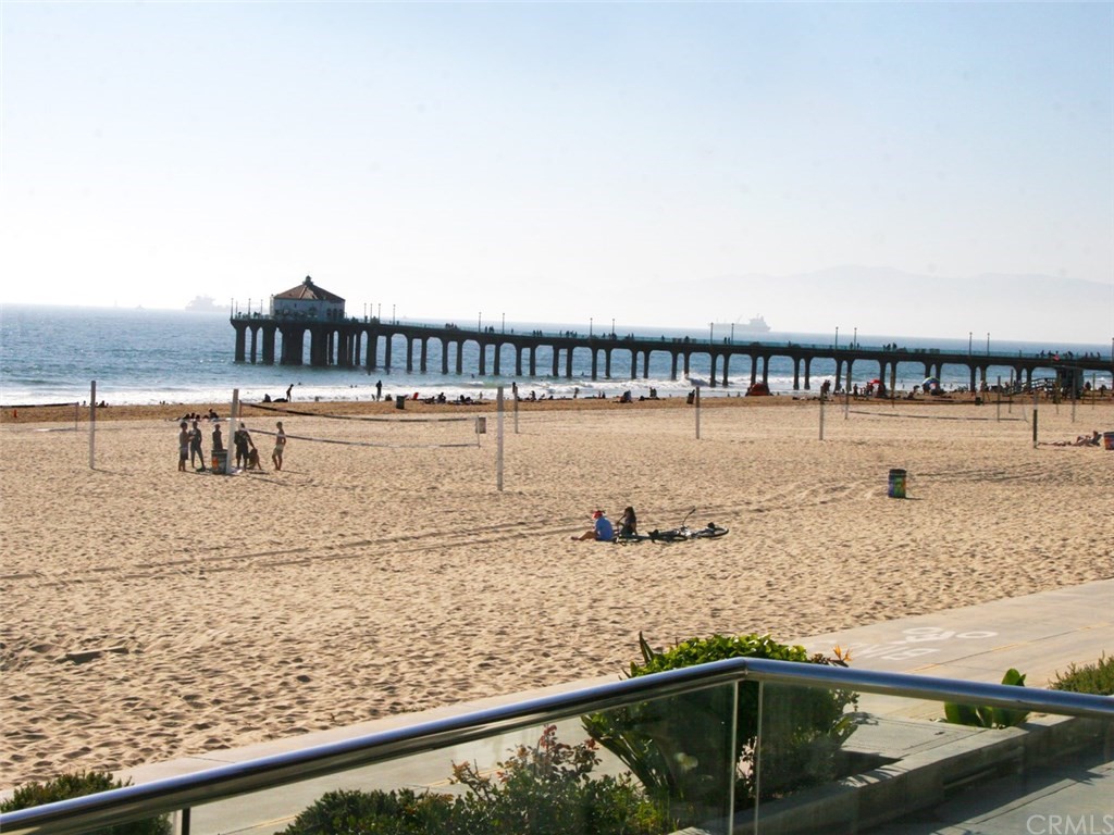 614 The Strand Manhattan Beach, CA 90266 - Photo 3 of 41 a view of ocean from a balcony