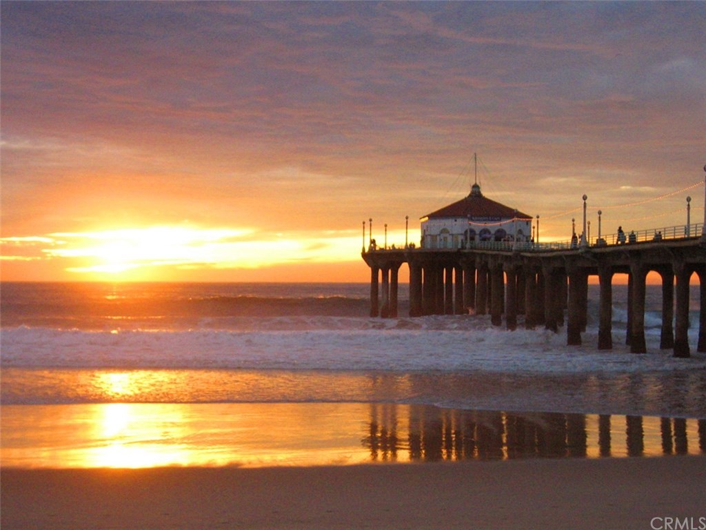 614 The Strand Manhattan Beach, CA 90266 - Photo 6 of 41 a view of a balcony with an outdoor space and seating area
