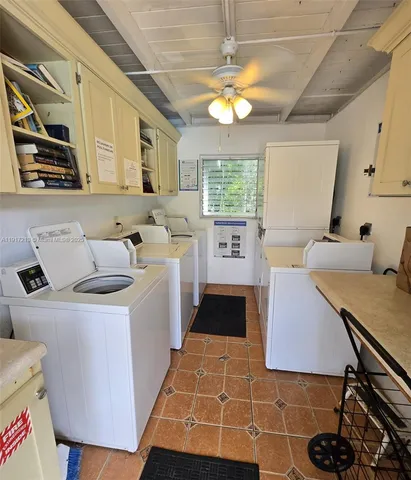 a very nice looking dining room with a table and chairs