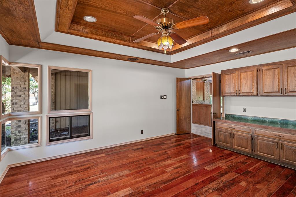 7508 Ravenswood Road Granbury, TX 76049 - Photo 22 of 40 a view of a livingroom with a fireplace