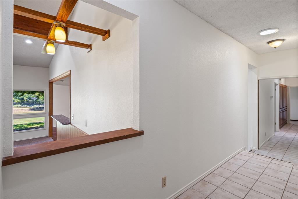 7508 Ravenswood Road Granbury, TX 76049 - Photo 25 of 40 a view of front door
